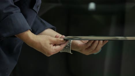 process of preparing windshield for replacement in car service