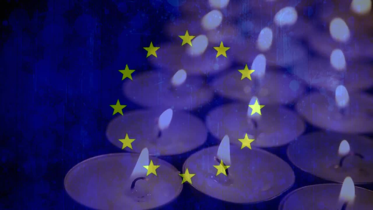 bandera europea y velas sopladas