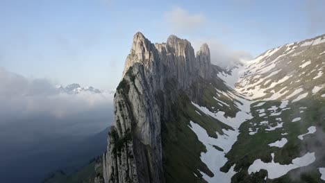 amazing rocky mountains in switzerland, saxer lucke, during a beautiful sunrise with clear blue sky