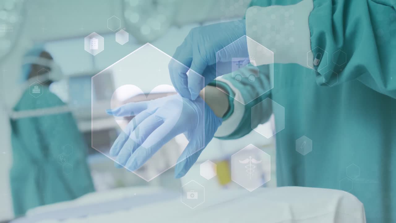 Animation von Herzschlag und medizinischen Symbolen über den Händen eines Chirurgen, der Handschuhe für eine Operation anzieht