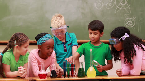 pupils at science lesson in classroom