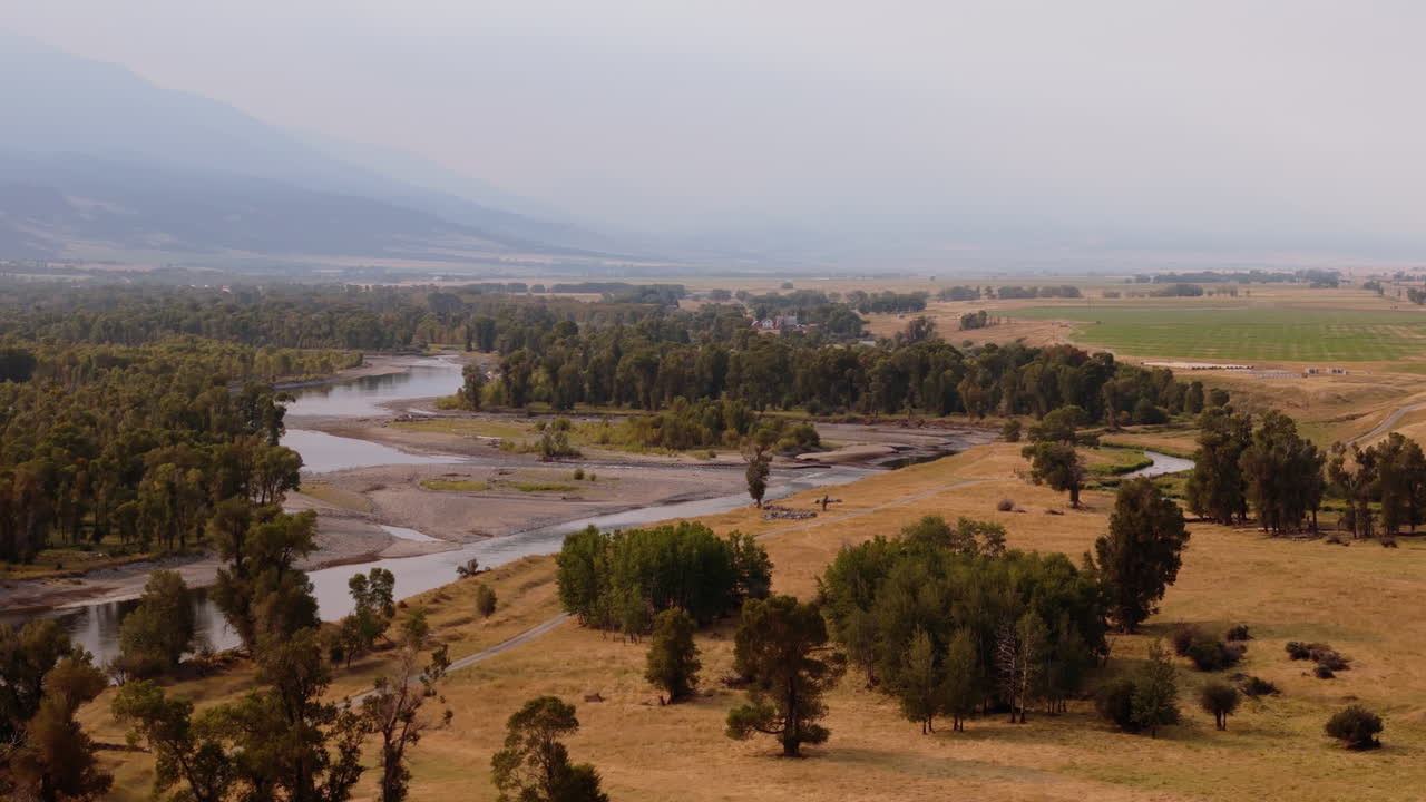 Aerial View of River Valley and Surrounding Landscape