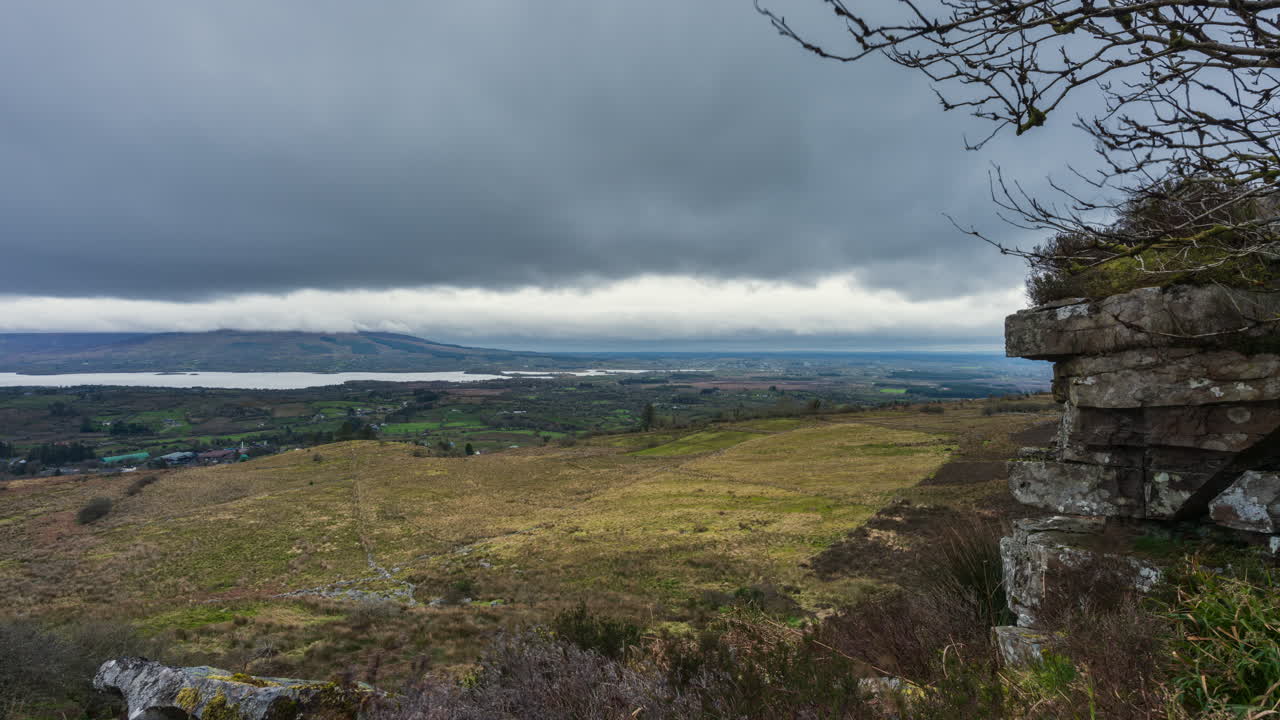 Overcast Landscape with Lake and Mountain Views