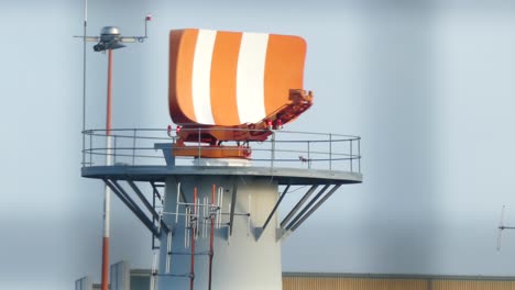 Airport-aerodrome-radar-tower-aviation-guidance-warning-system-spinning-closeup