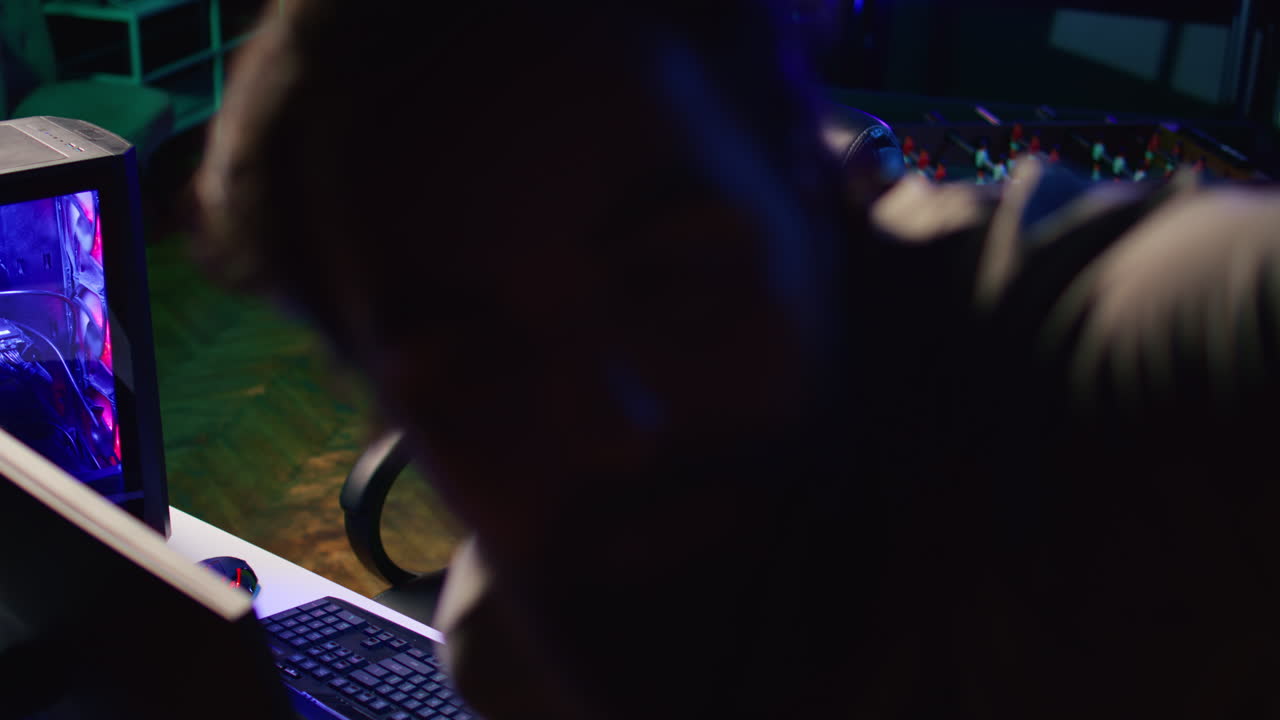 Professional gamer arriving in studio, greeting fans during livestream, talking about gaming systems