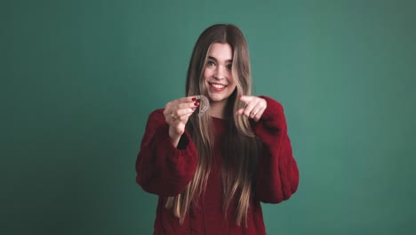 young woman showing a transparent dental bracket