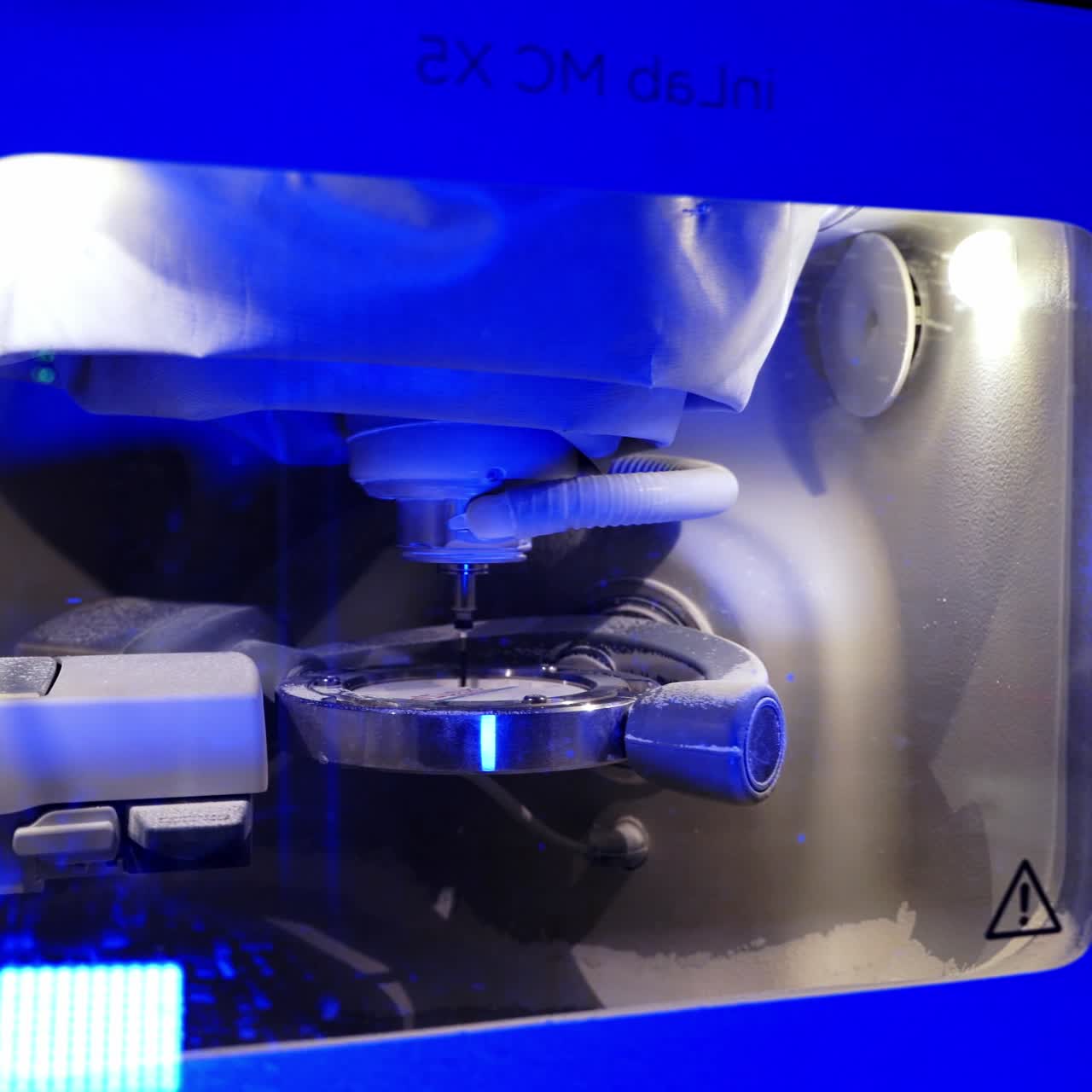Machine producing prosthesis implants. Process of manufacturing dentures in the dental laboratory