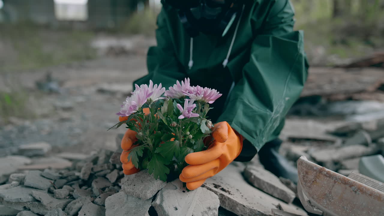 Human in hazmat planting in urban city. Farming in apocalypsis.