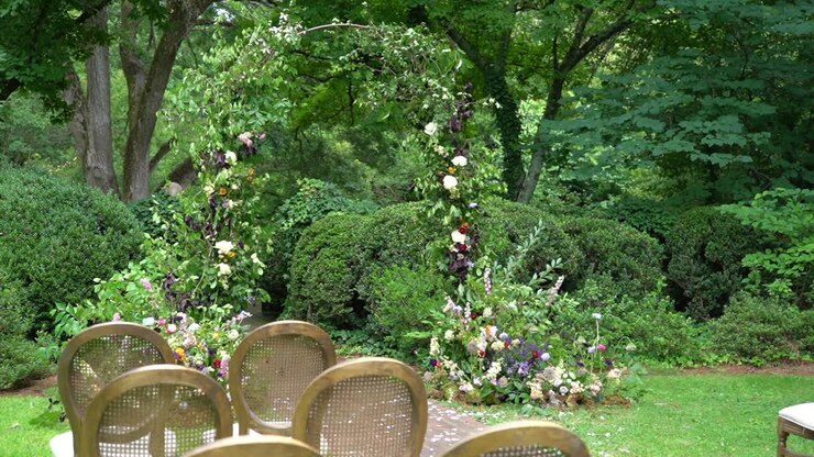 Slider shot of wedding alter for an intimate outdoor afternoon ceremony in nature or a backyard