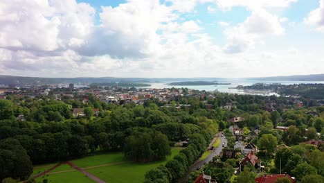 Aerial-from-The-Vigeland-Park-in-Oslo,-Norway-with-view-over-the-city-and-fjord