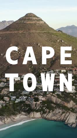 Vertical-Video-Of-Coastline-With-Ocean-And-Countryside-In-South-Africa-Overlaid-With-Animated-Graphic-Spelling-Out-Cape-Town