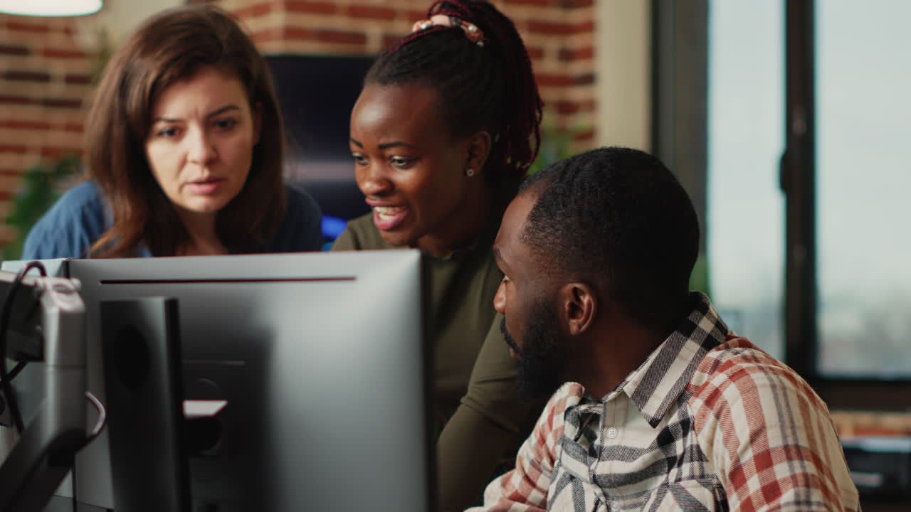 Group of software developers using creative skills to plan new advanced interface