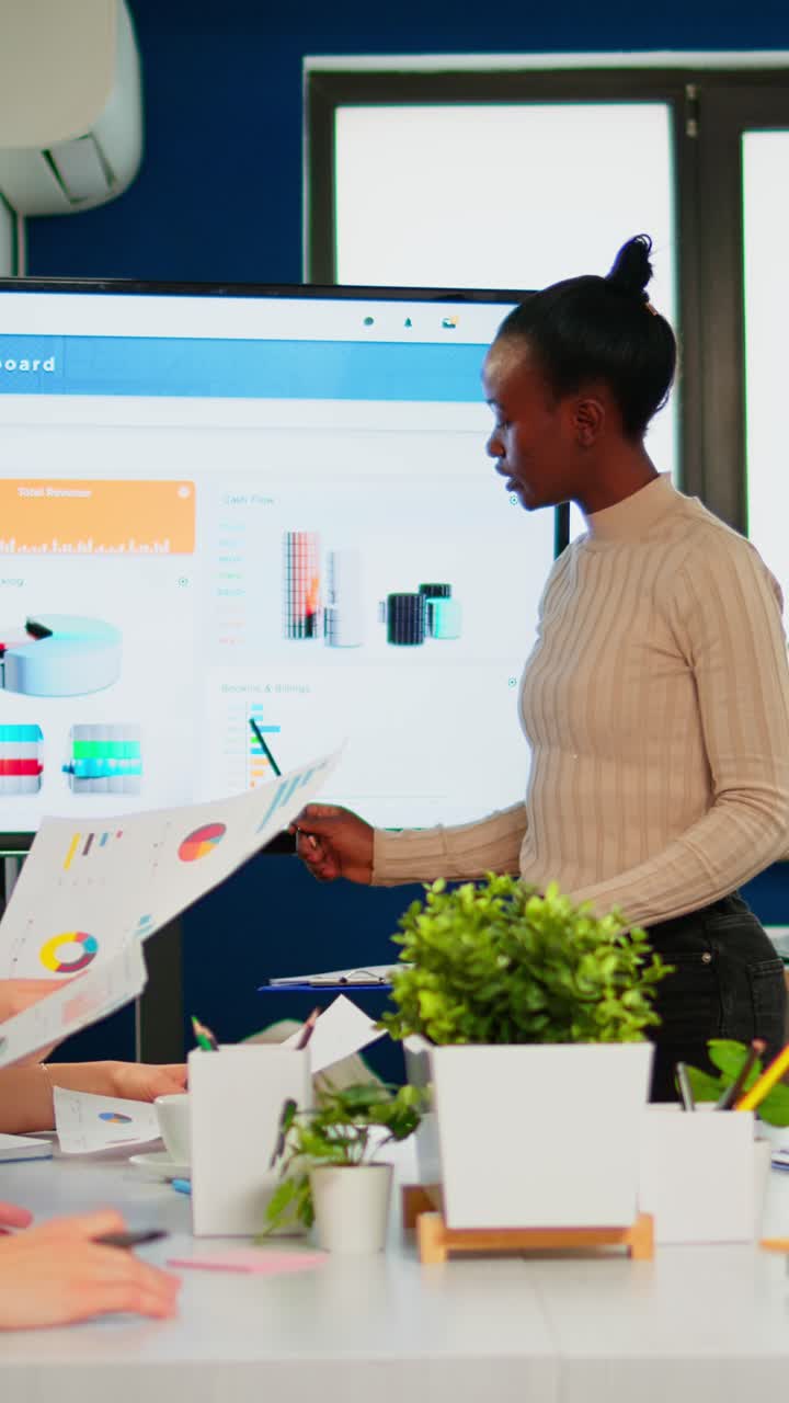 Vertical video Furious woman manager arguing employees for bad work result