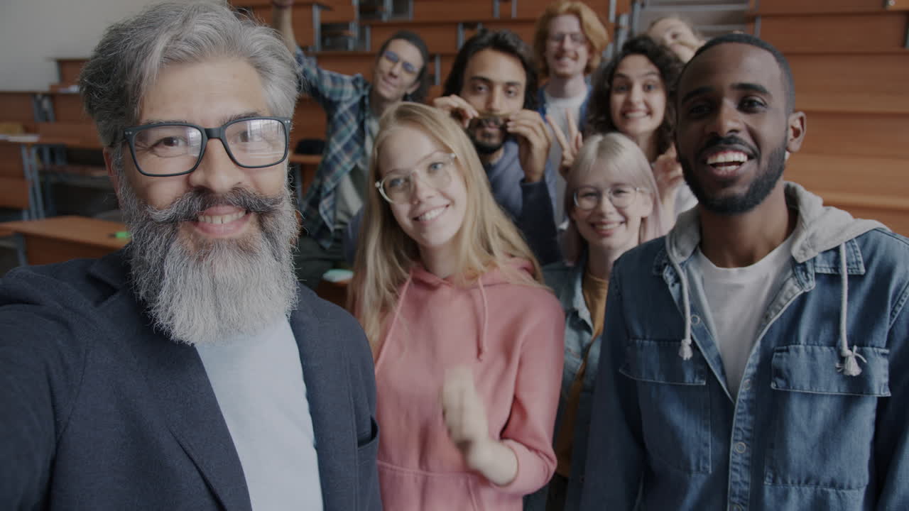 Professor and Students Taking a Selfie in a Classroom