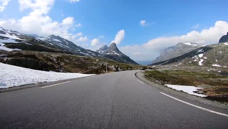 A-scenic-drive-through-the-Norwegian-countryside-following-another-vehicle