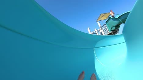 First-person-view,-the-descent-from-the-waterslide-on-holiday