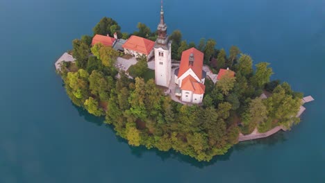 top down view of lake bled church in slovenia