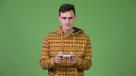 young handsome man playing games