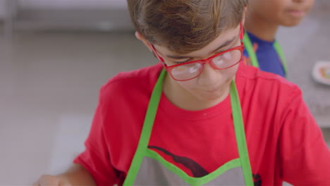 minichef kid preparing a fillet mignon or cordon blue