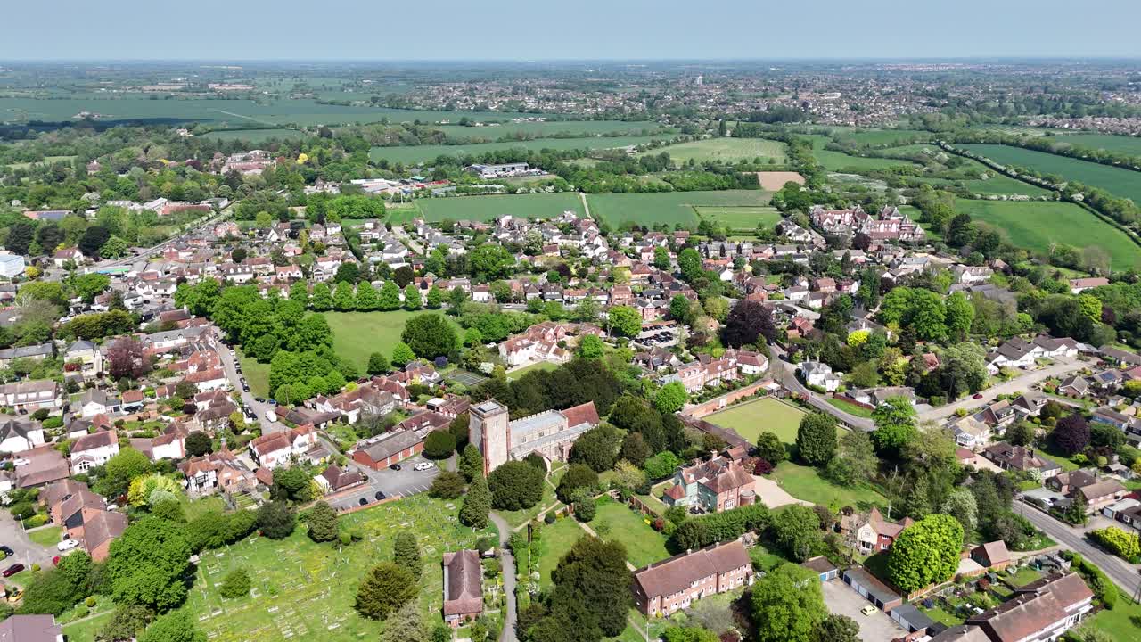 Writtle Village Essex UK pull back drone aerial reverse reveal establishing footage