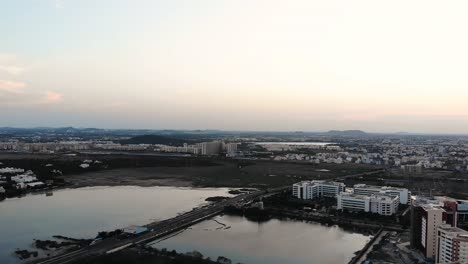 aerial sunset view sholinganallur in chennai. follow shot, pan right