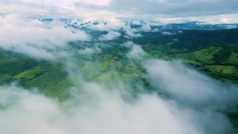 4k cinematic nature aerial drone footage of the beautiful mountains and paddy fields of ban pa pong piang at doi ithanon next to chiang mai, thailand on a cloudy day