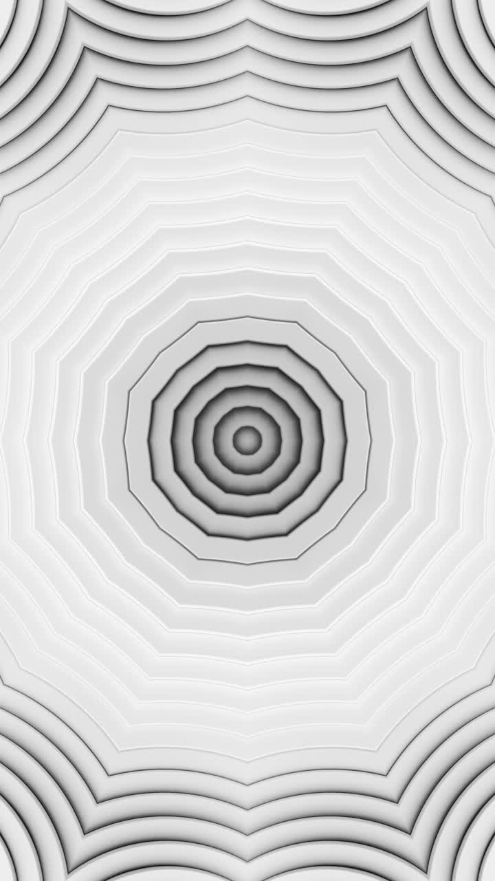 White background with circular pattern in the center. Kaleidoscope VJ loop Vertical