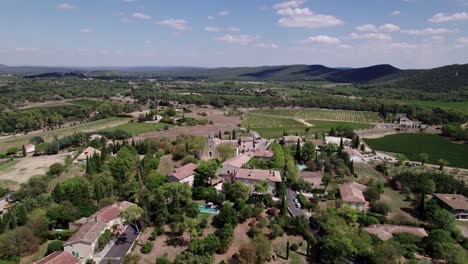 aerial establishing drone shot overhead a luxurious mansion in the french countryside