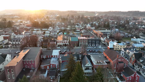 beautiful aerial truck shot of small town in usa at sunrise