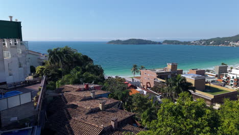 descending drone movement in the part of bombinhas coastal municipality and tropical vegetation, santa catarina, brazil