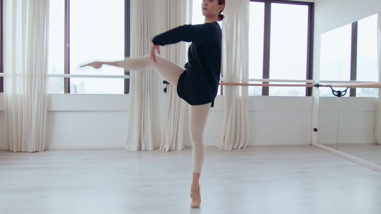 Graceful Girl Dancing Ballet in Studio