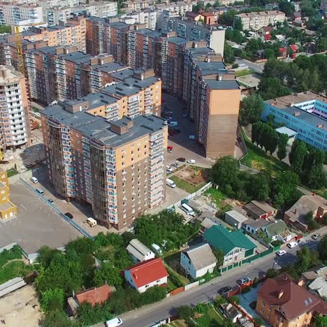 construction site in the city. modern district build in the downtown. new residential area on the urban background. aerial view.