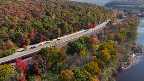 Mountain-train-in-mountains-with-colorful-autumn-fall-foliage