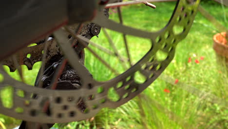 close up shot of a bicycle disc brake spinning and stopping