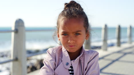 tantrum, girl portrait and angry child by the sea