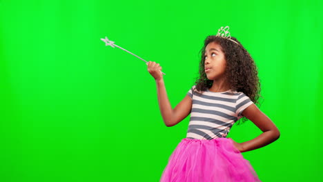 child in costume, green screen with wand