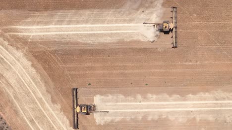 This-footage-captures-the-synergy-of-modern-agricultural-technology,-showcasing-the-essential-role-of-header-fronts-in-the-wheat-harvesting-process