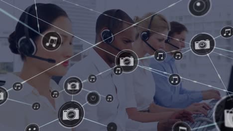 Animation-of-network-of-connection-with-icons-over-business-people-wearing-phone-headsets