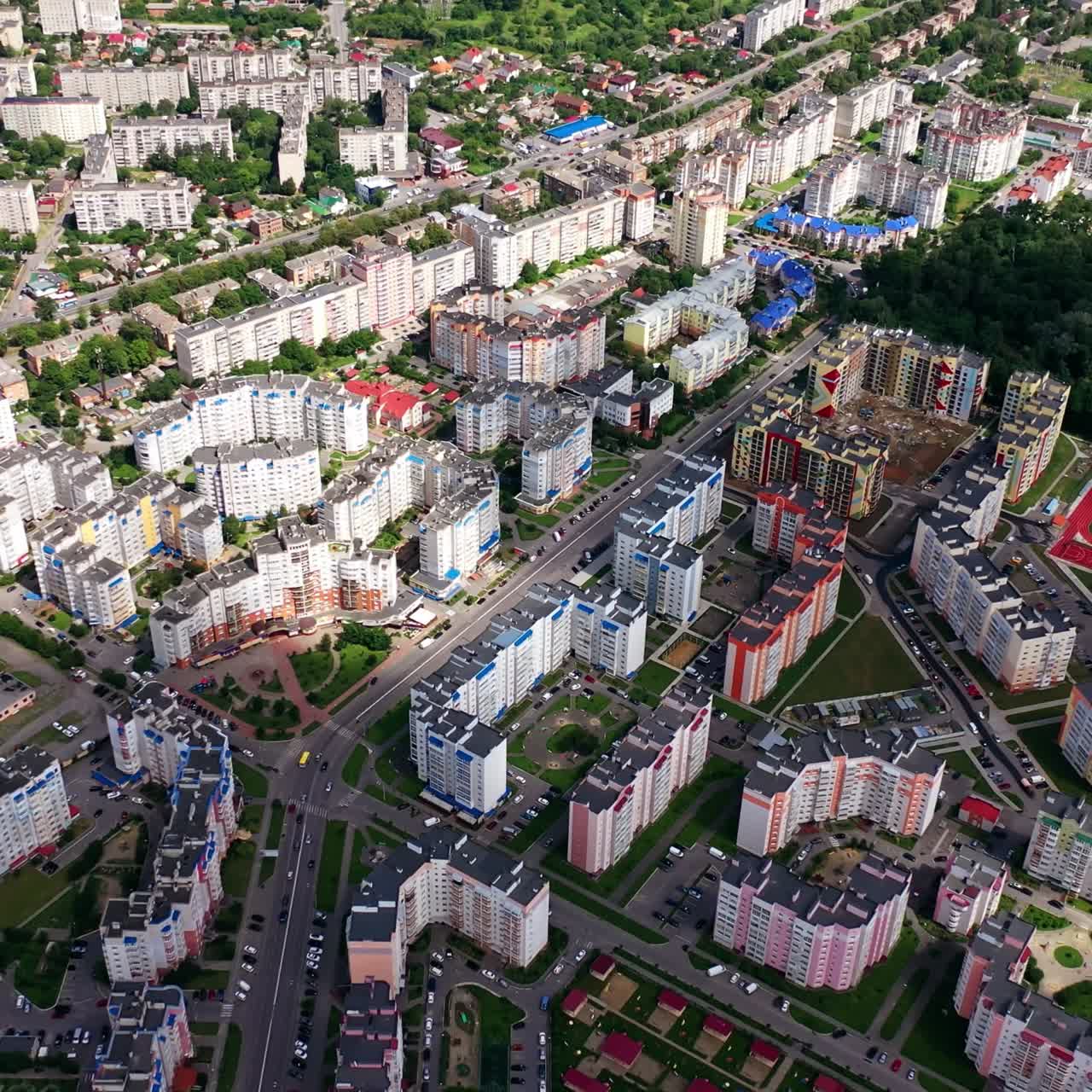 High-rise buildings in the city. Modern architecture on the urban background. Amazing view of a cityscape. Top down view.