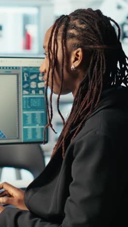 vertical video photovoltaics factory programmer analyzing data with machine learning tech