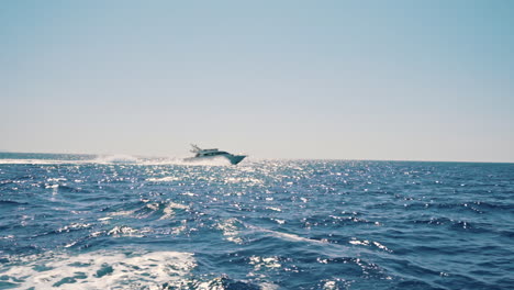 centered-motor-boat-racing-on-the-ocean-with-full-speed