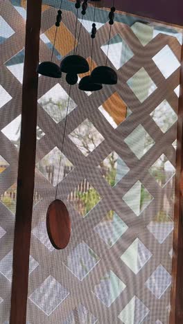 wind chimes on a screened porch