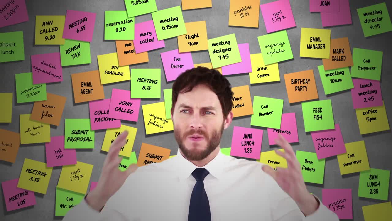 un hombre de negocios estresado con las manos en la cabeza.