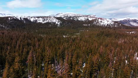 inyo national forest minarets vista point tioga pass road yosemite minarets summit mountains mammoth lakes ski resort vista point view california aerial drone sunny clouds daytime snow forward pan up