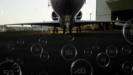 5g and 6g network bubbles animation over airplane in hangar