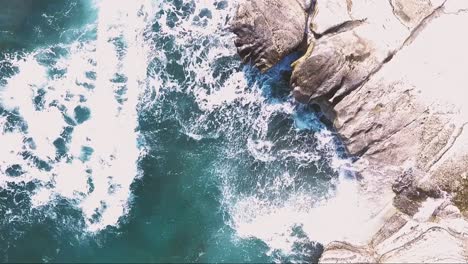 sea waves crushing on white rock coastline in cyprus