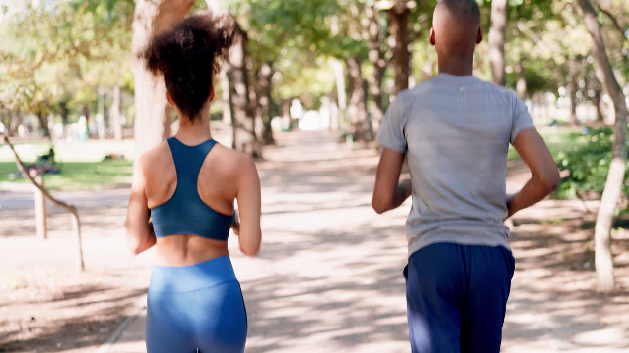 Fitness, running and couple in park from back