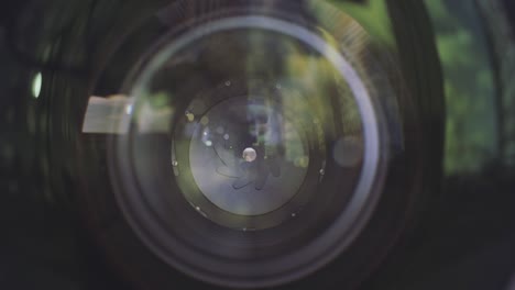 camera lens aperture close up. action. outdoors view of a professional camera lense with aperture closed blades