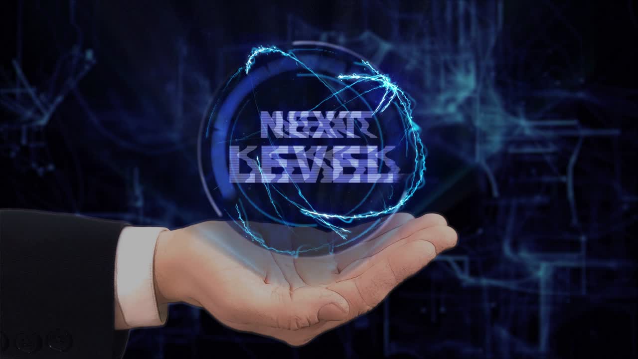 Painted hand shows concept hologram Next level on his hand