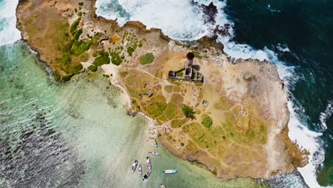 Aerial-drone-view-of-a-lighthouse-on-Ile-aux-Fouquets,-Ile-au-Phare,-Bois-des-Amourettes,-Mauritius